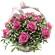 arrangement of pink roses with babys breath